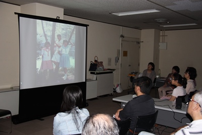 A DST screening party. Zhang Min's works is being shown in this photo.