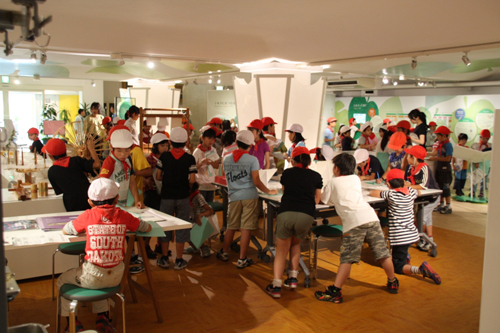 Students gathered around the hands-on corner.