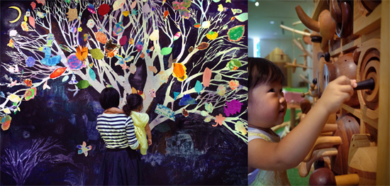 The 'Tree of Life' where children can add leaves that they created / The Drawers of Sensation, where children can feel the wood