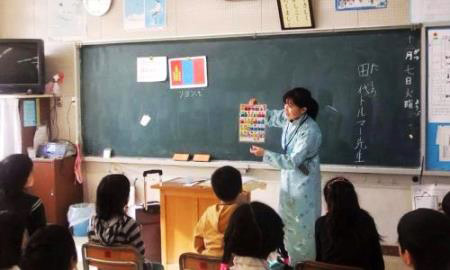 Dulam teaching at the primary school