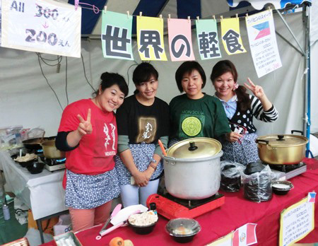 Dulam introducing Mongolian home cooking at the International Fair